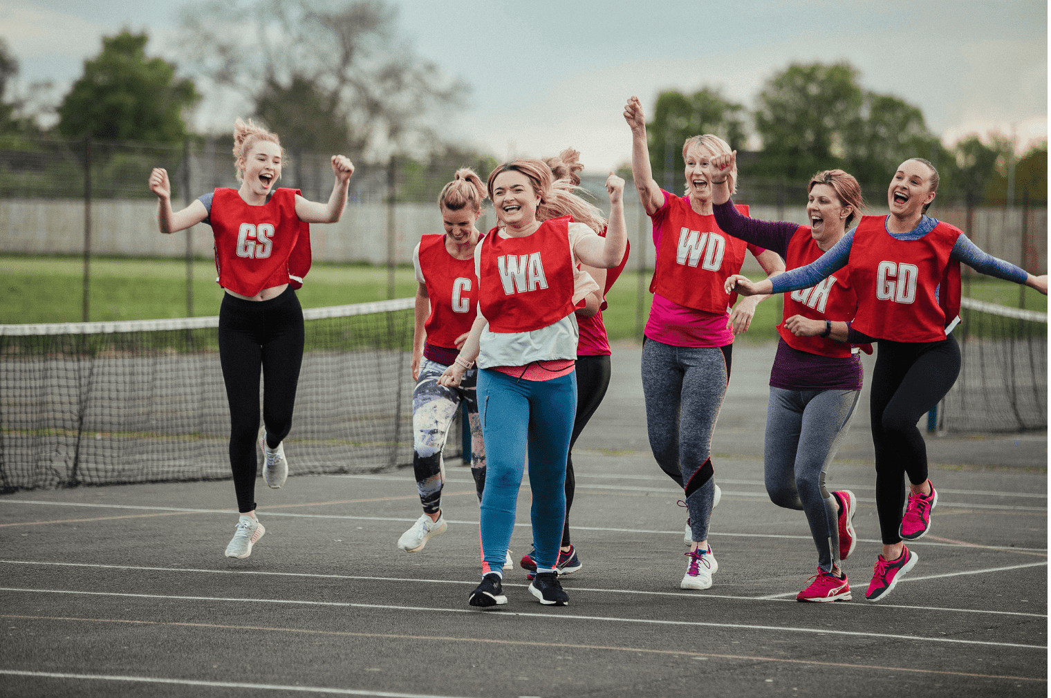 Featured image of a netball team celebrating for Leagues4You